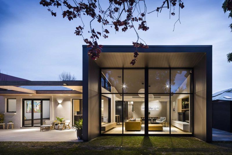 Contemporary rear bungalow extension in Adelaide with floor-to-ceiling windows and open-plan living.